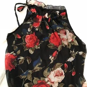 Sleeveless, tie string top blouse. Floral.